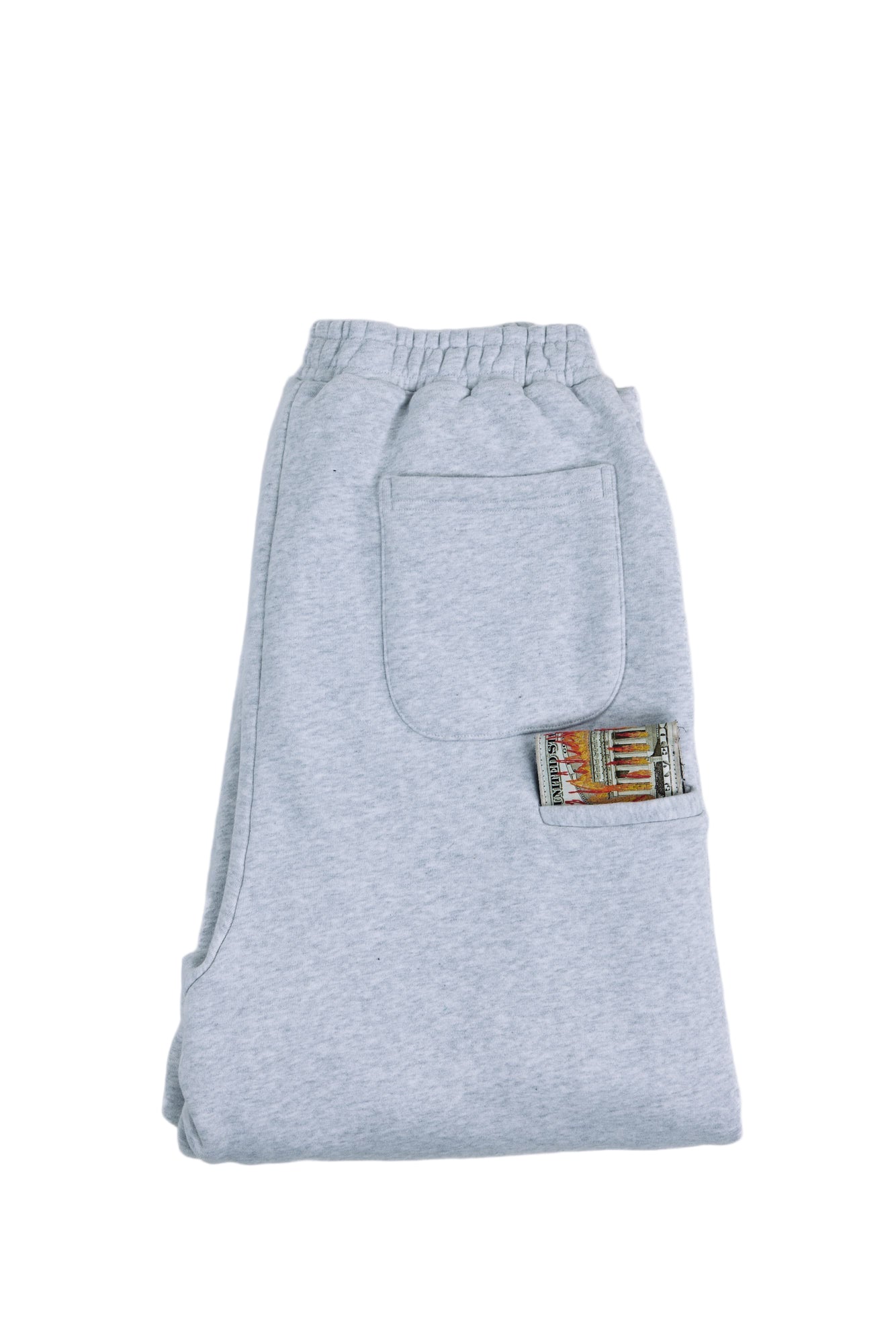 Gray sweatpants with a patch on a white background